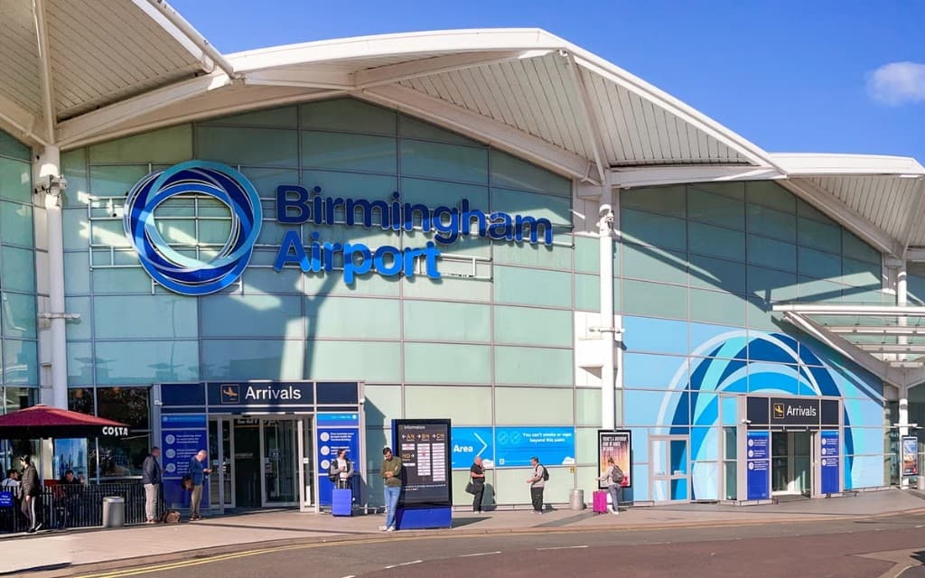 Birmingham Airport terminal with Birmingham Airport signage