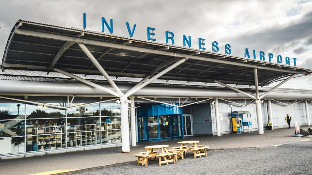 Inverness Airport main entrance with Inverness Airport signage