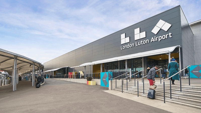 London Luton Airport terminal with London Luton Airport signage